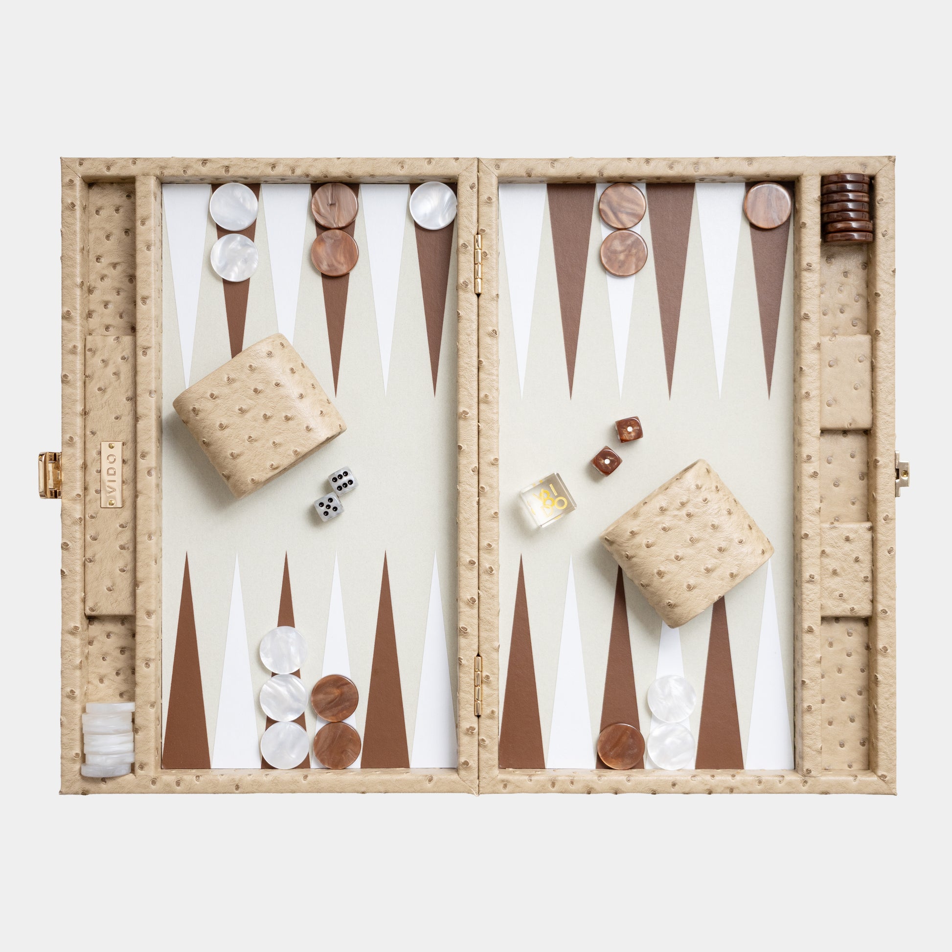 Backgammon set beige ostrich with pieces and dice on a white background by VIDO