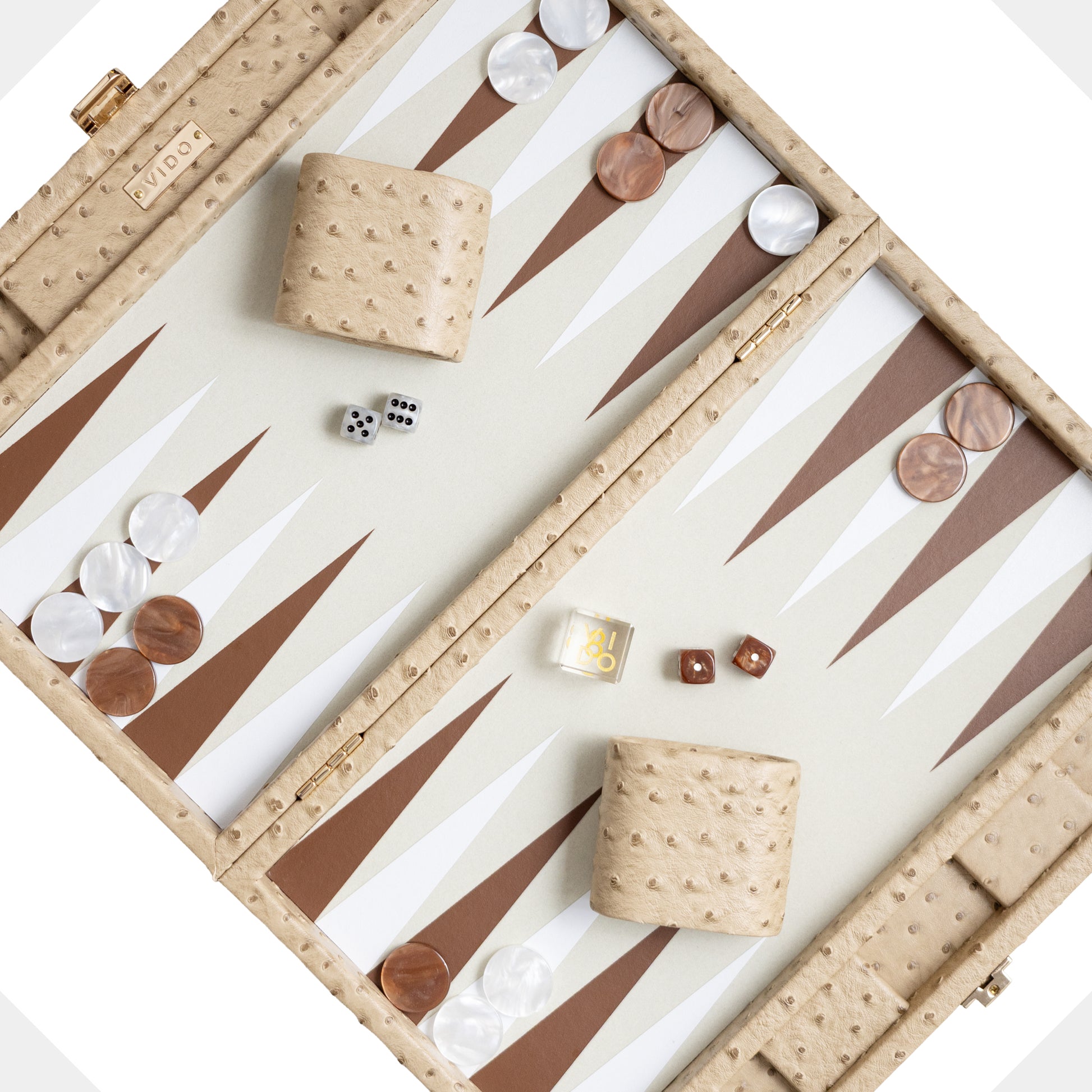 Backgammon set beige colour with pieces and dice on a white background by VIDO
